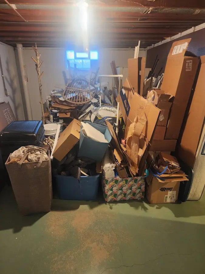 Roll-off dumpster container at job site for 4 Yard Dumpster Rental in Bloomer